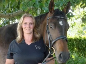 Equine artist Kim Penner in her studio